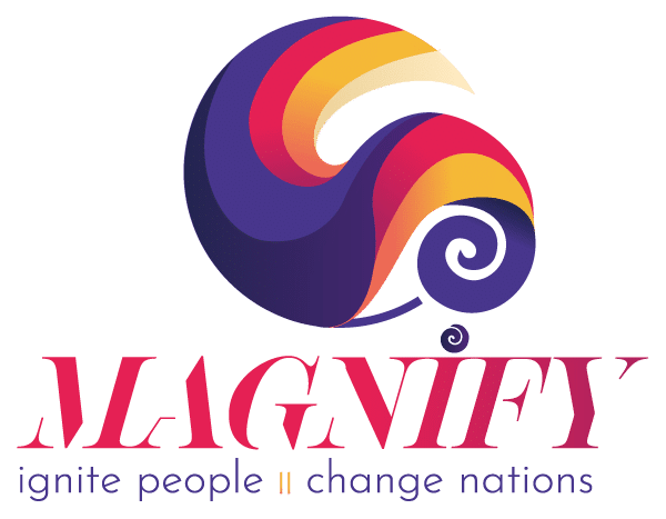 the Magnify logo with a variety of colours. In the shape of a circle breaking out in to a wave and a Koru shape form New Zealand. The name and slogan beneath the icon